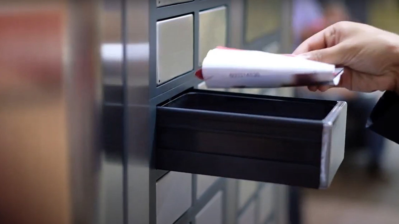 ecos-drawer-hand-puts-documents-inside